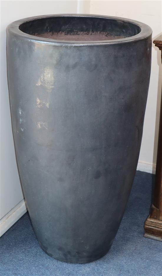 A pair of large gun metal planters H.90cm